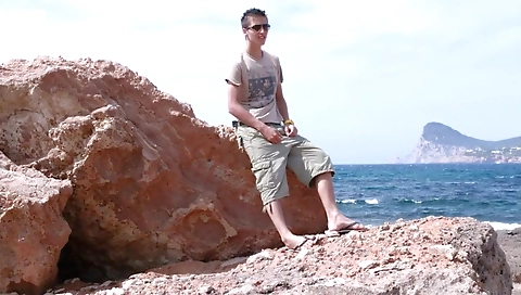 Sexy blond destination initiates on the beach